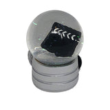 Movie strip with clapboard inside Snow Globe Gallery Image