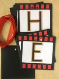 Hollywood Banner Film Strip Letters on Red Ribbon Gallery Image